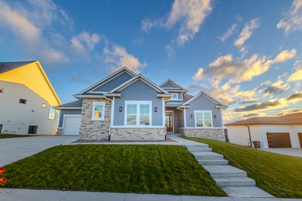 3927 Westgate Pkwy: Front exterior of the stone and blue-gray ranch