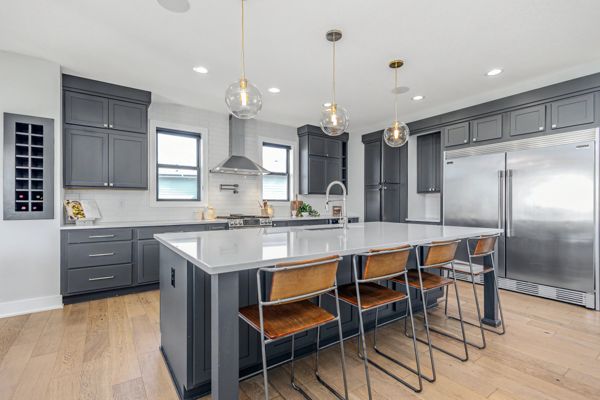 Kitchen with dark cabinets and island